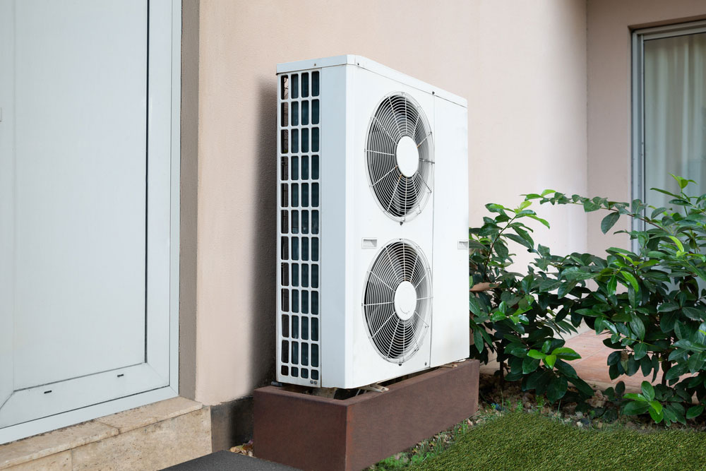 Air Conditioner Unit Standing Outside Of The House